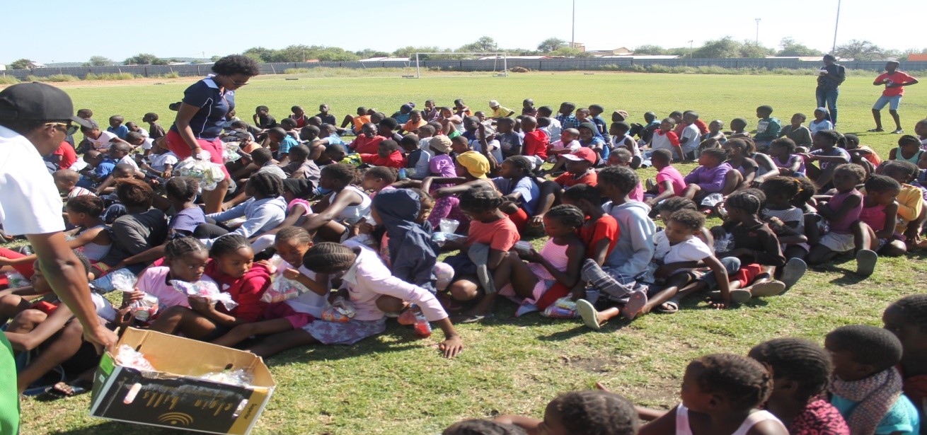 Children receiving refreshments after the FNB Kwata-Cricket Fun Day-Outjo